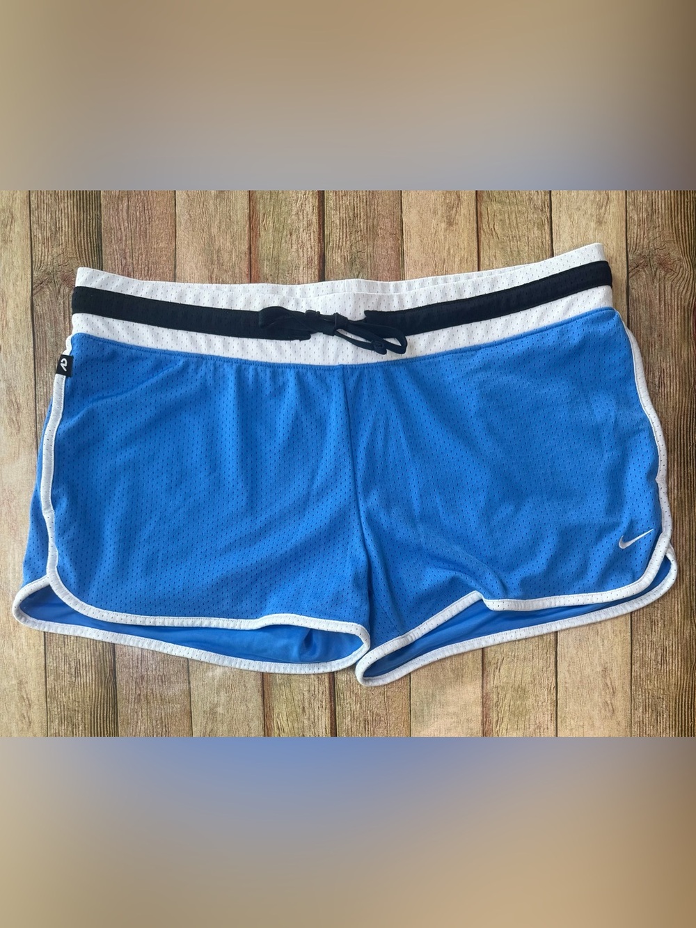Nike Blue Athletic Mesh Shorts with White Trim and Black Drawstring